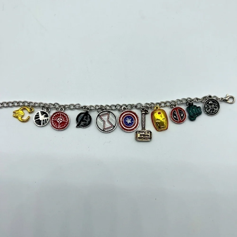 AVENGERS character charm bracelet featuring Thor’s hammer and other symbols